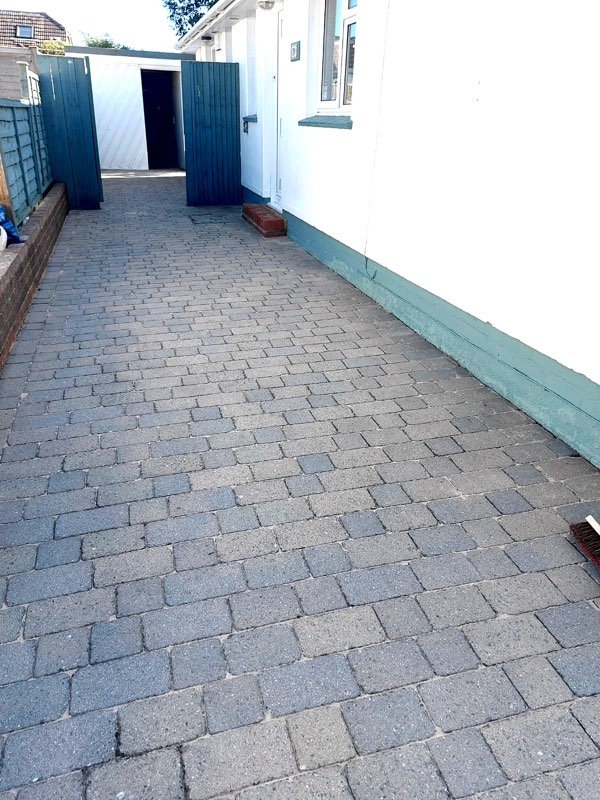  Pressure washing a driveway 